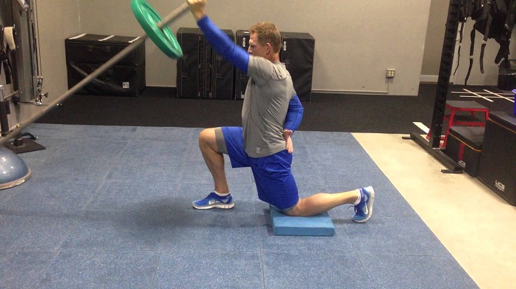 Half-kneeling landmine press