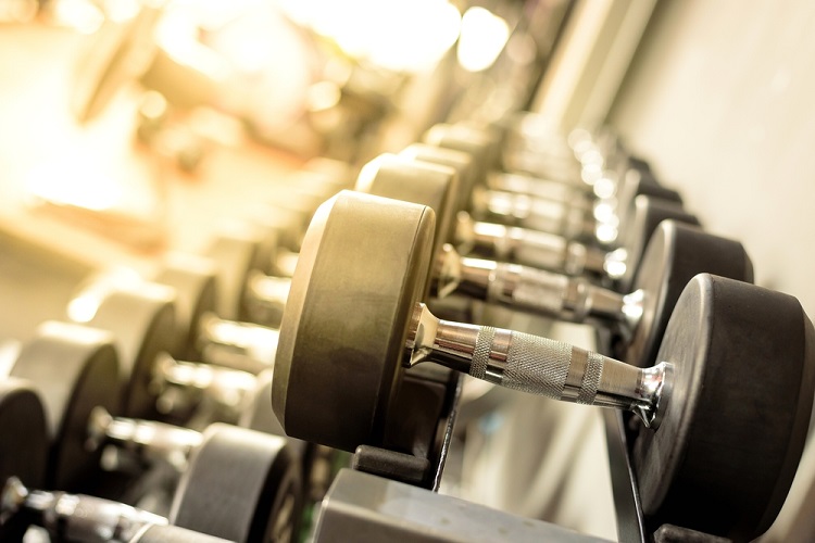 How to Perform Dumbbell Sumo Deadlift Properly
